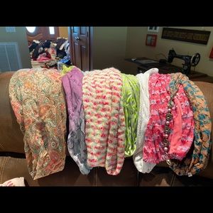 7 multi colored and brand scarfs.